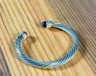 This lot features a bracelet by Alwand Vahan with sterling silver, 14k gold, & amethyst. This piece measures, 7” and has a total approx. weight of 17.77 grams. With origins in Paris, France, Alwand Vahan has been designing fine jewelry for over 100 years, now carried on by third-generation Alwand Vahan, also known as "Sacha."

