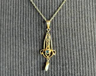 This lot features a beautiful 10k gold Victorian lavaliere with a pearl drop on a 12k gold filled chain measuring, 20”. Total approx. weight is 2.73 grams.

