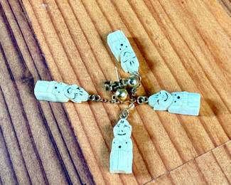 This lot features an antique Alaskan Inuit Billiken, held together by 12k gold fill.

