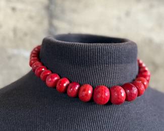 This lot features what is believed to be a graduated red coral necklace with a sterling silver clasp, measuring 17”.

