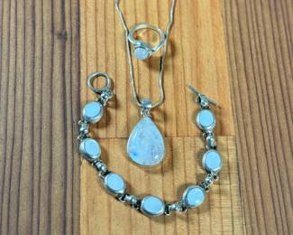 This lot features a beautiful set of jewelry set in sterling silver with what appears to be moonstones. The ring comes in a size 5.25, the bracelet measures, 7” and the necklace measures, 18”. Marked 925/Mexico and has a total approx. weight of 36.55 grams.

