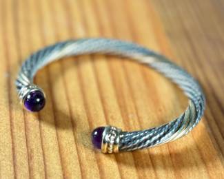 This lot features a bracelet by Alwand Vahan with sterling silver, 14k gold, & amethyst. This piece measures, 7” and has a total approx. weight of 17.77 grams. With origins in Paris, France, Alwand Vahan has been designing fine jewelry for over 100 years, now carried on by third-generation Alwand Vahan, also known as "Sacha."

