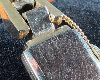 This lot features a 14k gold Leman watch with a total approx. weight of 28.5 grams. The watch is accompanied with an appraisal, is a manual wind with a 17-jewel Pathe Watch Co. movement, and runs/sets fine with safety clasp. The watch is 6.5” in length.

