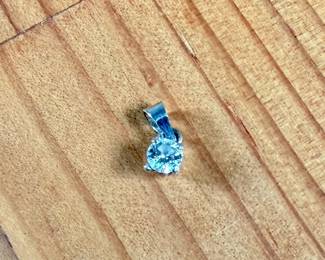 This lot features a 14k white gold pendant with a nearly 1/2 carat diamond. Total approx. weight of 1.18 grams.

