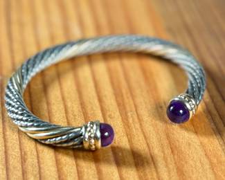 This lot features a bracelet by Alwand Vahan with sterling silver, 14k gold, & amethyst. This piece measures, 7” and has a total approx. weight of 17.77 grams. With origins in Paris, France, Alwand Vahan has been designing fine jewelry for over 100 years, now carried on by third-generation Alwand Vahan, also known as "Sacha."

