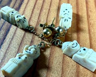 This lot features an antique Alaskan Inuit Billiken, held together by 12k gold fill.

