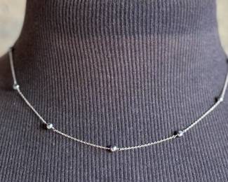 This lot features a 14k gold necklace with genuine pearls. The necklace measures, 18” and has a total approx. weight of 2.18 grams.


