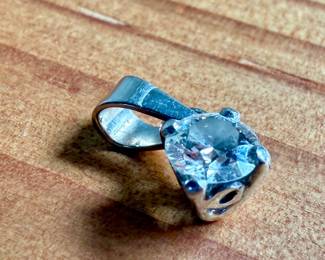 This lot features a 14k white gold pendant with a nearly 1/2 carat diamond. Total approx. weight of 1.18 grams.

