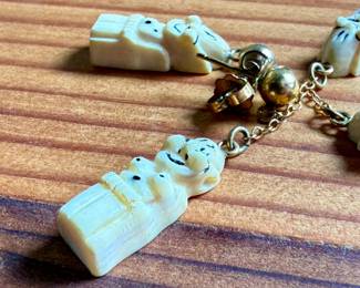 This lot features an antique Alaskan Inuit Billiken, held together by 12k gold fill.

