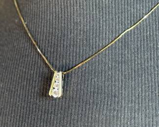 This lot features a beautiful sterling silver pendant with cz diamonds on a 925 chain measuring, 18”.

