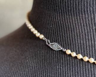 This lot features a beautiful graduated genuine pearl necklace with a 10k gold clasp measuring, 17”.

