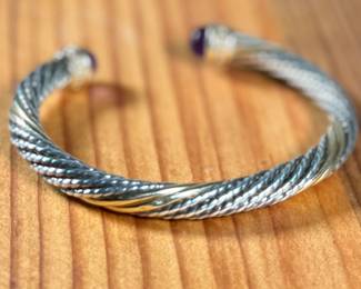 This lot features a bracelet by Alwand Vahan with sterling silver, 14k gold, & amethyst. This piece measures, 7” and has a total approx. weight of 17.77 grams. With origins in Paris, France, Alwand Vahan has been designing fine jewelry for over 100 years, now carried on by third-generation Alwand Vahan, also known as "Sacha."

