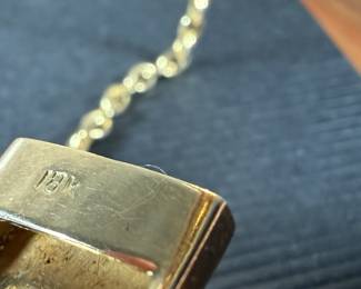 This lot features an incredible hand made 18k gold & diamond Art-Deco bangle bracelet with an integrated box clasp and safety chain. Accompanied with an appraisal from Reliant Gem Lab, this bracelet has a total approx. weight of 41.71 grams and .23 ct of thirteen (13) bead set single cut diamonds. 

