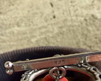 This lot features what is believed to be a graduated red coral necklace with a sterling silver clasp, measuring 17”.

