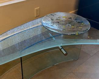 Modern Glass Bean coffee table with metal accents. 