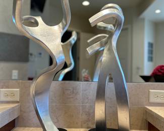 Hivo G. Van Teal. Abstract Figurative Sculptures Titled "Fred and Ginger" Silver gilt Lucite with black lacquer lucite base. Signed. 27 inches.