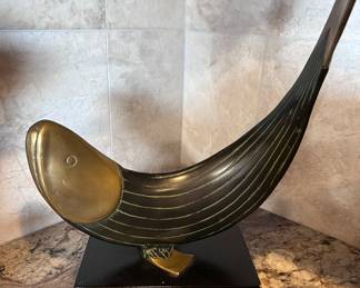 Dolbi Cashier Metal Fish Sculpture on black wood base. 