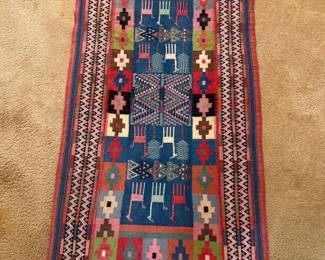 2'2" by 4'6" Kilim with embroidered border and details.  A real stunner! 
Professionally Cleaned 