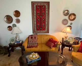 Mahogany coffee table with inset beveled glass top, pair of mahogany end tables with inset beveled glass tops, satin glass lamps, Turkish copper, Turkish pottery 