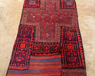 3'2" by 7'4" Tribal wool and camel hair rug with  3 different weave styles 
Professionally Cleaned. 