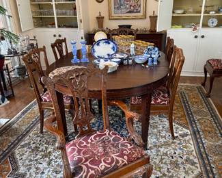 Dining Room 
Chippendale style dining room table with 8 chairs 
Large area rug