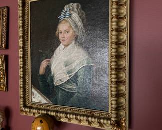 Living Room 
Ornate frame with portrait painting
Enamel bird