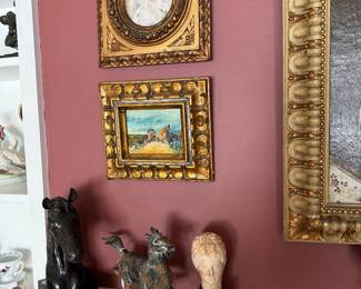 Living Room 
Bronze horse bust
Horse statue
Bust
Ornate frames