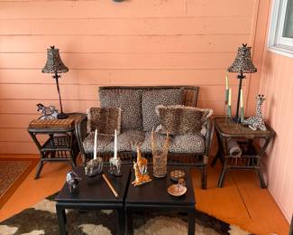 Porch 
Rattan loveseat & end tables
Giraffes/zebras/safari items