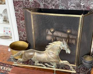Living Room 
Massive brass horse weather vane