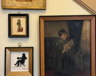 There is a huge selection of art in this house.  There are antique and vintage framed prints, and reproduction folk art that was created by the homeowner