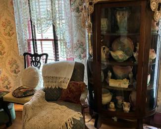 Curio cabinet with more Hull pottery