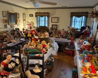 Large room full of antique and vintage toys