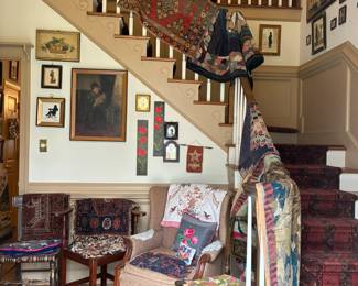 Foyer- lots of antique/ vintage framed art and reproduction folk art