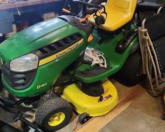 John Deere D130 Riding Lawn Mower with Tow-Behind Spreader