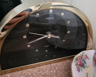 Seiko QQZ137G Half Moon Gold Black Mantle Clock