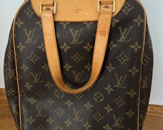 $490 - Louis Vuitton expedition M with Authentication card 