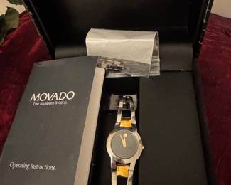 #98 - $200 - Movado Amoroso lady watch onyx face with extra link 