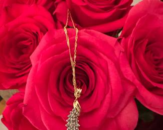 #23 - $480 - Approx 1ctw diam pendant(1.7 grs) , 14kt yellow gold chain 21"L (1.2gr) 