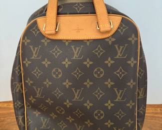 $490 - Louis Vuitton expedition M with Authentication card 