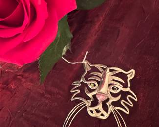 #15 - $200 - Jen Thunderhorse artist (Philadephia) well know for her Southerwestern silver jewelry 1980's - Tiger face brooch with one peridot eye missing.  