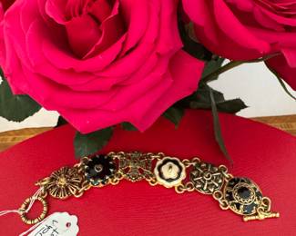 $50 - St John stamped costume bracelet 