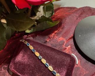 #14 - $675 - 14kt gold & blue topaz bracelet 7.5" L - 6.2 grams. 