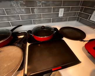 Lots of pots and pans and baking sheets