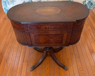 Vintage and lead drum table that opens this is a unique piece