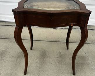 English inlayed tufted showcase.