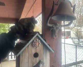 Cast iron bell and birdhouse