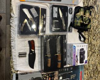 Several knives and night vision binoculars 
