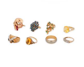 1106
A Group of 14K Gold and Gem-Set Rings
Including eight rings, accented by diamonds, emeralds, fire opal, sapphires, rubies, citrine and black diopside
8 pieces

Sizes: 4 1/2 - 9
48.0 grams
Estimate: $1,500 - $2,000