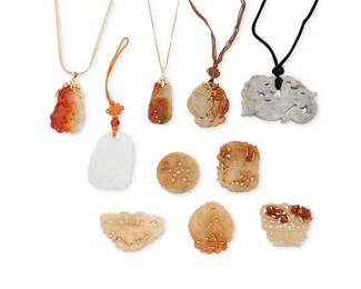 1044
A Group of Carved Hardstone Jewelry
Including six elements and four necklaces

185.9 grams gross
Estimate: $300 - $500