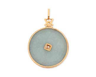 1035
An 18K Gold and Jade Pendant
Featuring a carved round jade disc with character motifs, set in an ornate 18k gold frame

Measures: 3 x 2 1/2 in.
45.7 grams gross
Estimate: $600 - $800